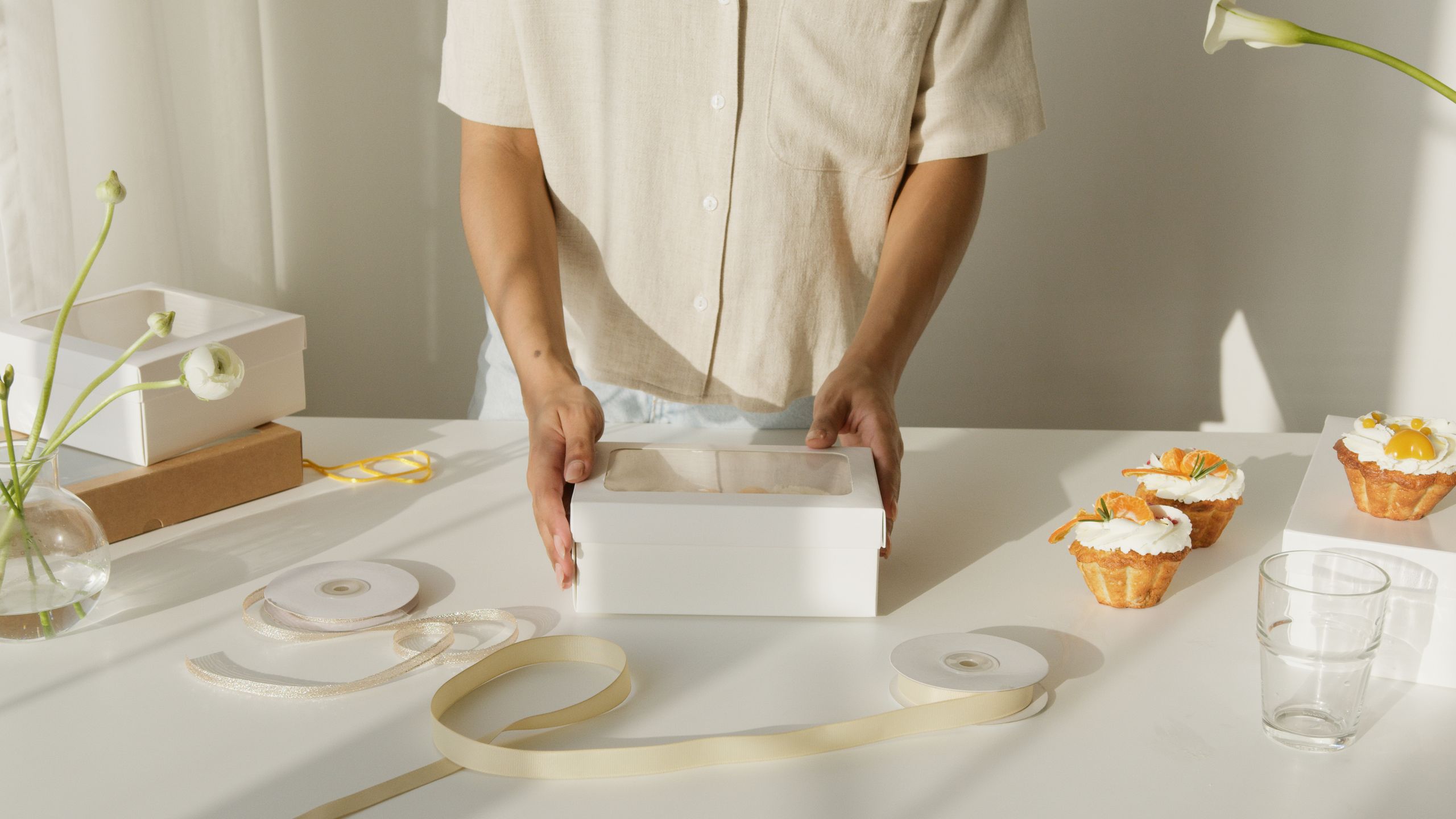 Gift box with baked goods and ribbon